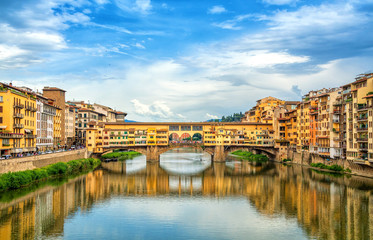 View of medieval stone bridge Ponte Vecchio over Arno river in Florence, Tuscany, Italy. Florence...