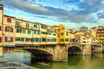Fototapeta na wymiar View of medieval stone bridge Ponte Vecchio over Arno river in Florence, Tuscany, Italy. Florence cityscape. Florence architecture and landmark.