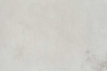 Wall fragment with scratches and cracks