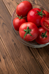 tomatoes on wooden background