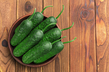 Cucumber on wooden background