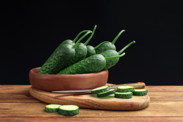 Cucumber on wooden background