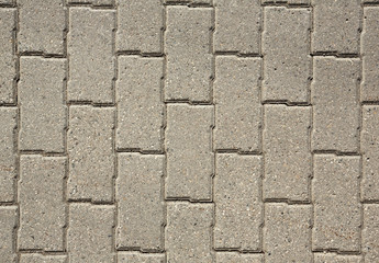 Obraz premium surface paved with road tiles. top view.