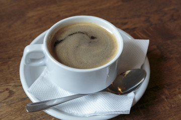 Delicious cup of americano coffee, business break.