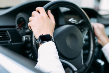 smart watch from the driver of the car.