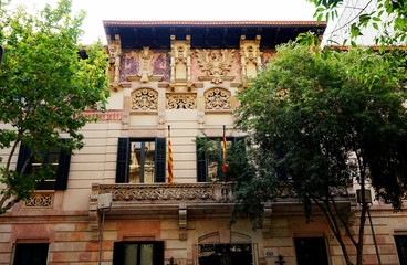 One of the facades of beautiful buildings in the Eixample quarter in Barcelona
