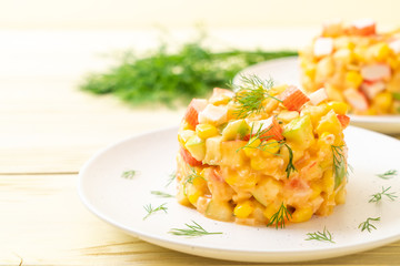 mixed fruit salad with crab stick (apple, corn, papaya, pineapple)