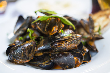 Eating shellfish in a restaraunt 