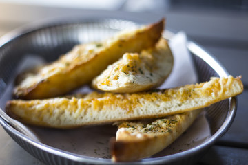 Eating bread at a resturant in the summer sun  