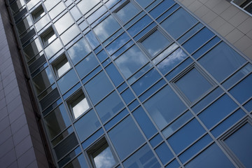 Architectural exterior detail of industrial office building with cloud