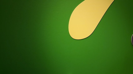 Green background with rounded shapes