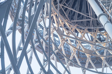 Blue steel water tower. Metal. Metal structures. Perspective.