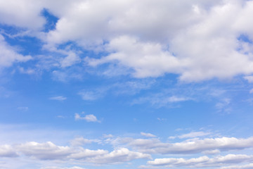 Naklejka na ściany i meble White clouds on blue sky background.