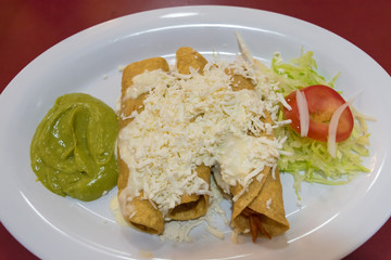Al pastor Cheese Tacos guacamole(Avocado saurce) and vegitables in Mexico
