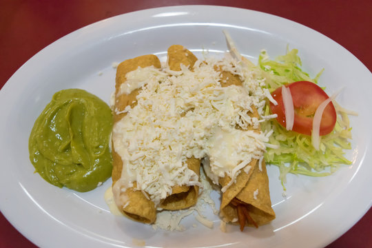Al pastor Cheese Tacos guacamole(Avocado saurce) and vegitables in Mexico