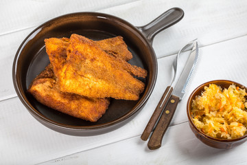 Pieces of cod in breadcrumbs.