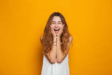 Portrait of a delighted young girl screaming