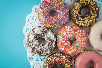 Assorted fresh donuts.