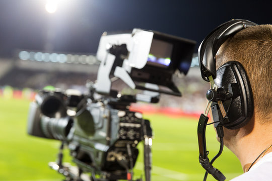 TV camera at the stadium during football matches. Television camera during the soccer match