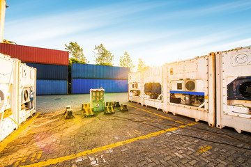 Stacked containers in a shipping terminal