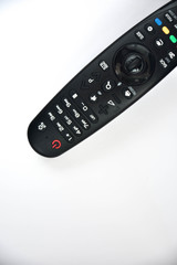 remote control over white background.