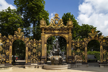 Fototapeta na wymiar Gates and fountains in Stanislas Place - Nancy - France