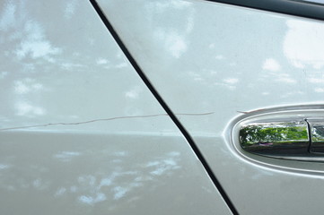 scratch from accident on silver color car background and texture