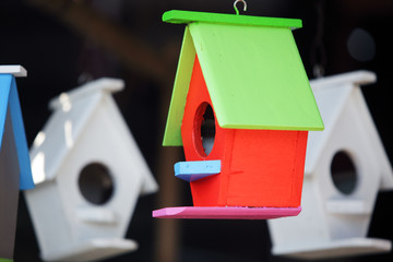 Obraz na płótnie Canvas colorful decoration wooden bird house