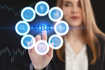 The concept of business, technology, the Internet and the network. A young entrepreneur working on a virtual screen of the future and sees the inscription: MBA