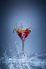 straberry ice and mint in the glass and splash fresh water
