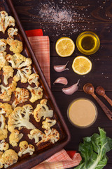 Overhead view of ingredients for roasted cauliflower hummus