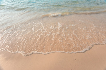 Small waves lapped the beach