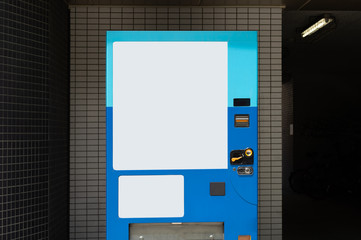 Empty white shelves of standard office vending machine