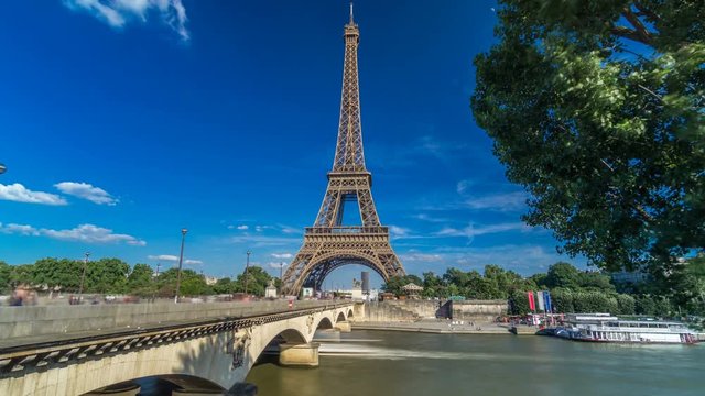 Eiffel Tower with bridge over Siene river in Paris timelapse hyperlapse, France