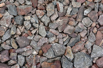 Crushed stone of various sizes, shapes, fractions. Industrial background