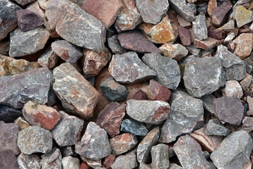 Crushed stone of various sizes, shapes, fractions. Industrial background