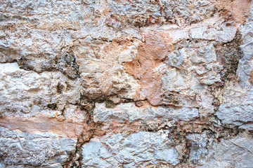 Obraz na płótnie Canvas Light colour old stone wall background texture.