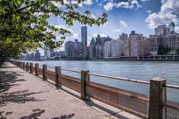 New york city skyline of midtown Manhattan and a path
