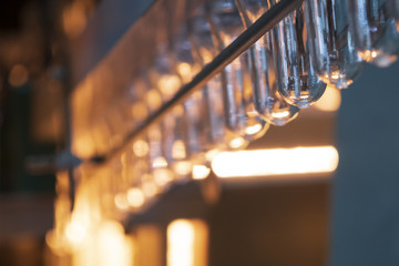 The preform shape of plastic bottle product in the heater for preheating process.Plastic bottle...