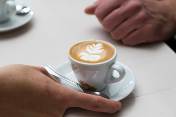 serving latte coffee