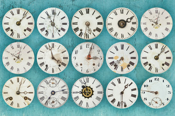 Pattern of different antique weathered clocks