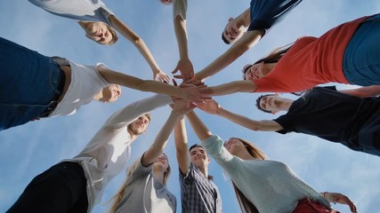 Close-up join hands group meeting, young people teamwork concept.