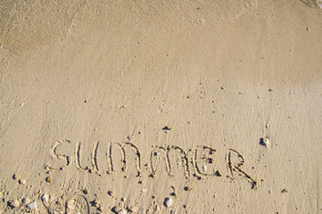 inscription Summer  on the sand