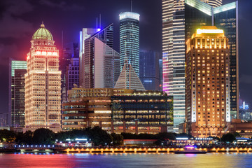 Fototapeta premium Scenic night view of glowing modern buildings in Shanghai