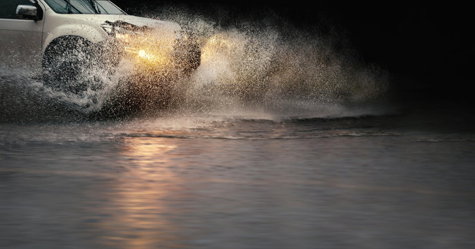 Stop Motion, High Resolution Image Of . Splash By A Car Through Flood Water After Hard Rain.