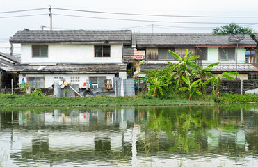 Fototapeta na wymiar Waterfront community in Thailand