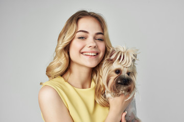 woman with dog smiling