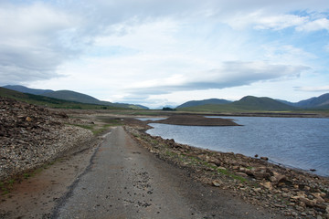 Looking westwards after crossing a very muddy section of a road which is normally submerged under Loch Glascarnoch