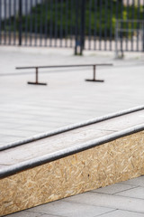 Grind box with skate rails in skatepark outdoor