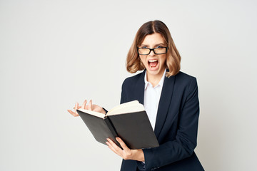 business woman in glasses with documents screaming